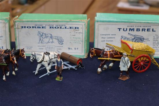 A collection of pre-war Britains Home Farm series models including a boxed farm wagon, boxed timber carriage, boxed tumbrel horse